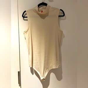 Spanx bodysuit. Size XL. Fits small.